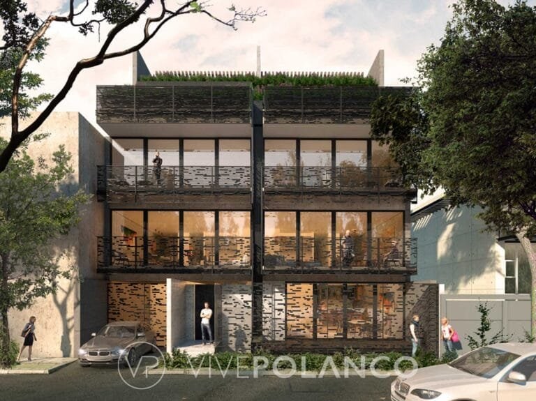 Fachada de edificio residencial de tres niveles con acabados en piedra, ventanas amplias y balcones en Eugenio Sue, Polanco