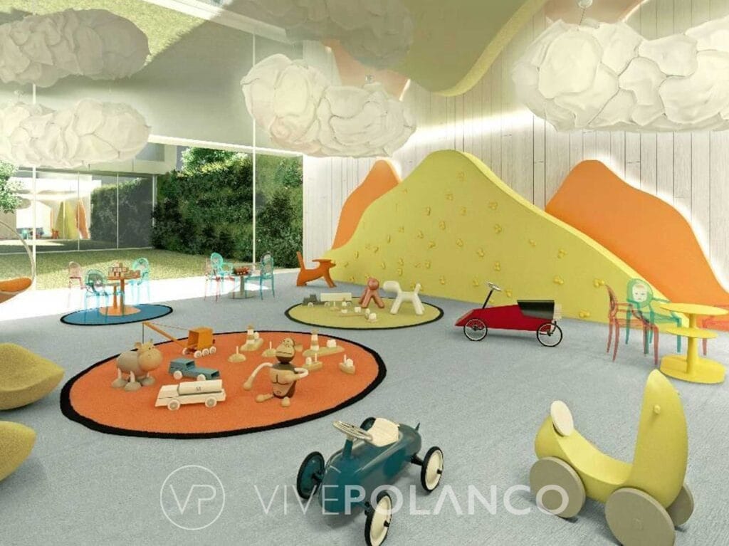 Área de juegos infantil moderna en Ruben Dario 225 con estructuras coloridas y juguetes