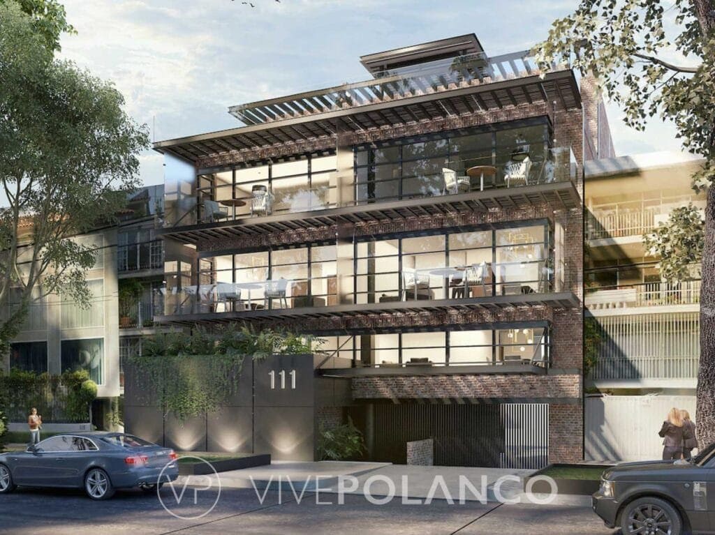 Fachada del edificio residencial Temístocles 111 con diseño contemporáneo de ladrillo y vidrio