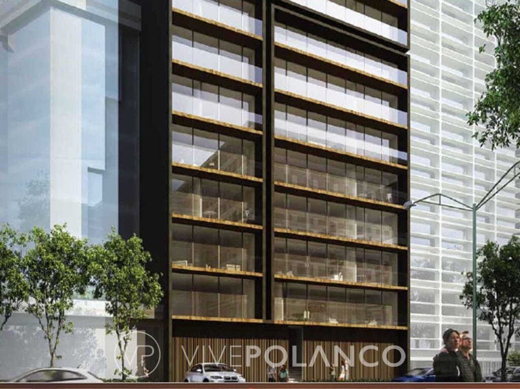Fachada del edificio Arquímedes 13 con ventanales de vidrio, marcos dorados y logotipo Vive Polanco en Arquimedes, Polanco