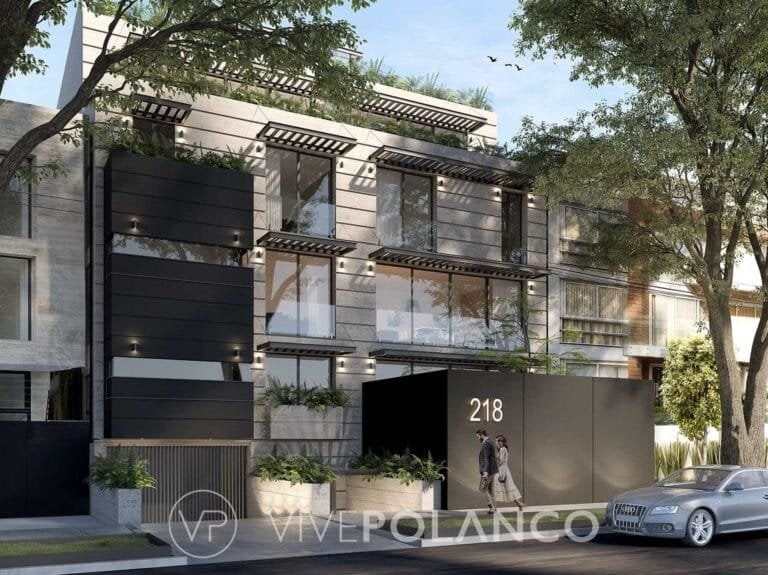 Edificio residencial moderno de tres pisos con balcones, fachada gris y beige, entrada marcada 218 en Calderón de la Barca 218, Polanco