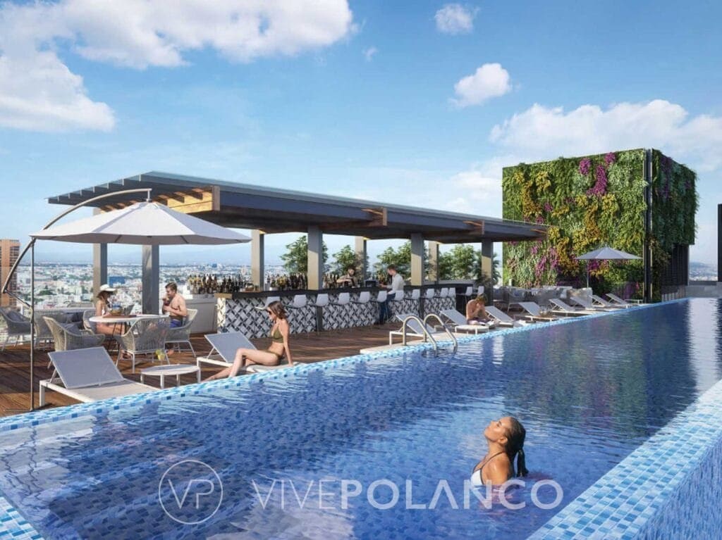 Rooftop de 724 Insurgentes 724 Sur Residences con alberca infinity, bar techado y muro verde vertical