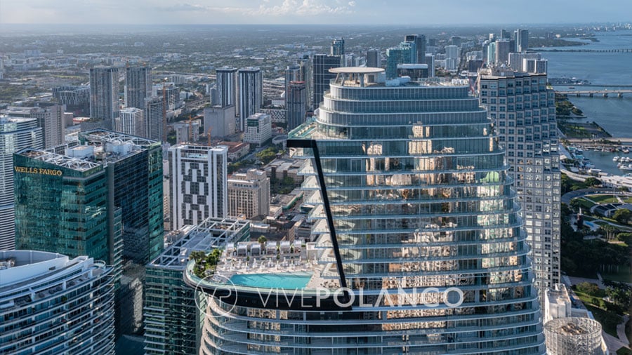 Aston Martin Residences Aerial view of modern skyscrapers and urban landscape in a bustling coastal city