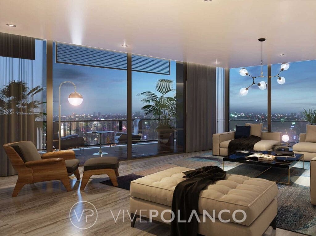 Sala de estar contemporánea con grandes ventanales, muebles en tonos beige y vista panorámica nocturna