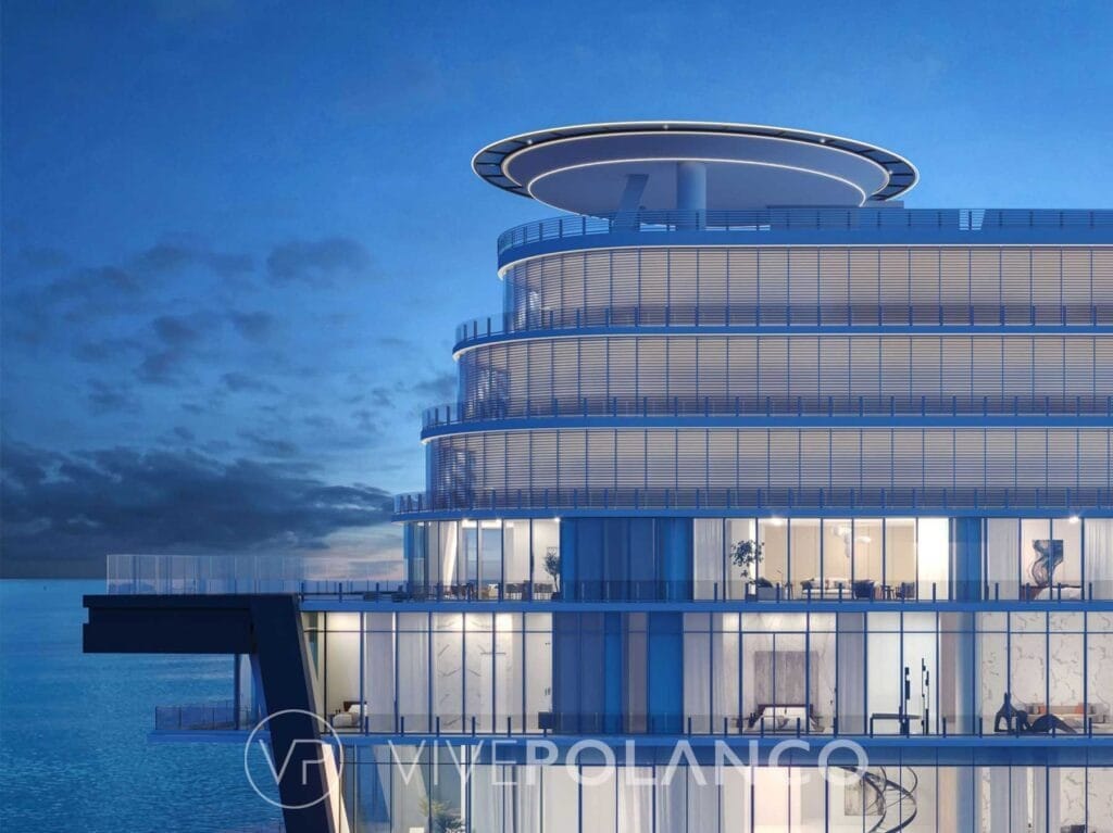 Vista exterior del edificio Aston Martin Residences con diseño cilíndrico, terrazas circulares y fachada de vidrio en Aston Martin Miami, Polanco