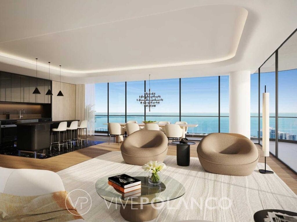 Sala de estar de lujo en Mercedes-Benz Places Miami con ventanales panorámicos, vista al océano y mobiliario moderno en Mercedes Benz Condo Miami, Polanco