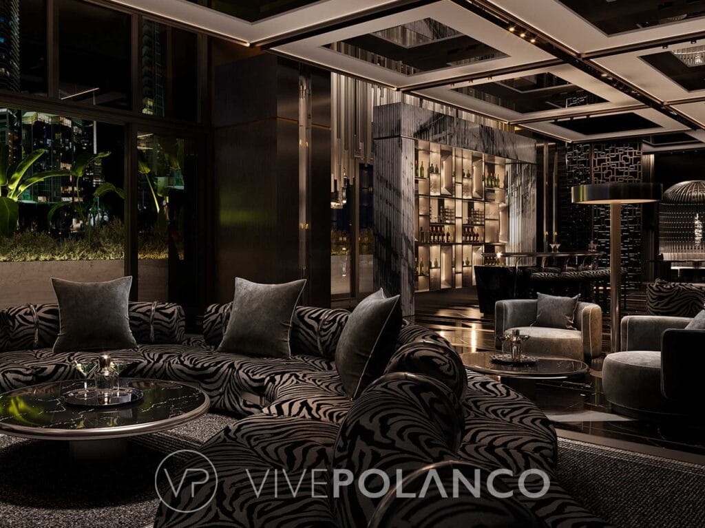 Elegante sala de estar en 888 Brickell Miami con sofás estampado cebra y cava de vinos de diseño
