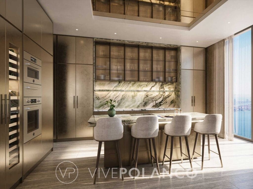 Cocina moderna de lujo en 888 Brickell Miami con isla central, bancos grises y gabinetes contemporáneos