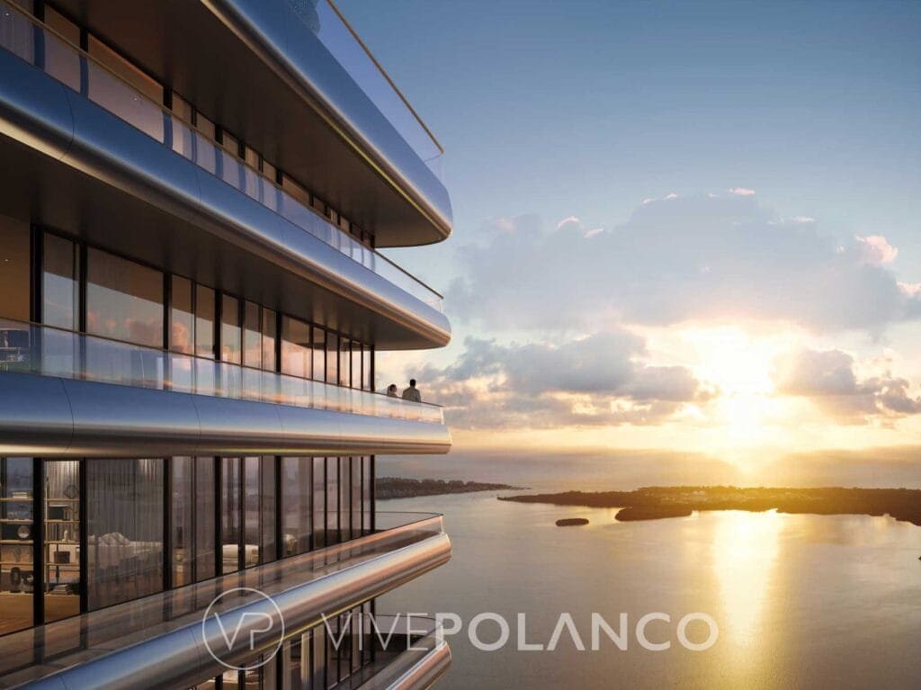 Balcones curvos del Mercedes-Benz Places en Miami con vista panorámica al atardecer sobre la bahía de Biscayne en Mercedes Benz Condo Miami, Polanco