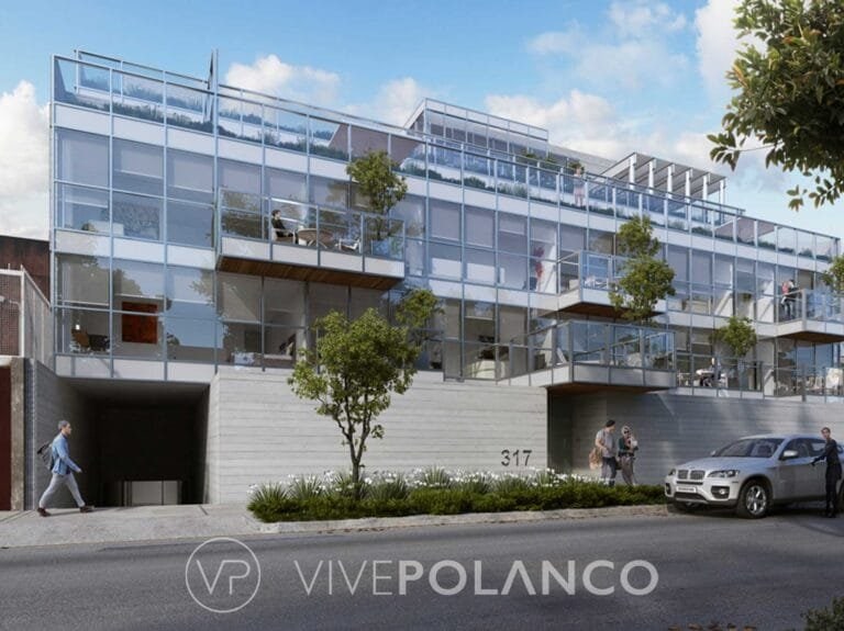 Edificio residencial moderno con fachada de cristal, balcones con vegetación y acceso a estacionamiento en Goldsmith 317, Polanco