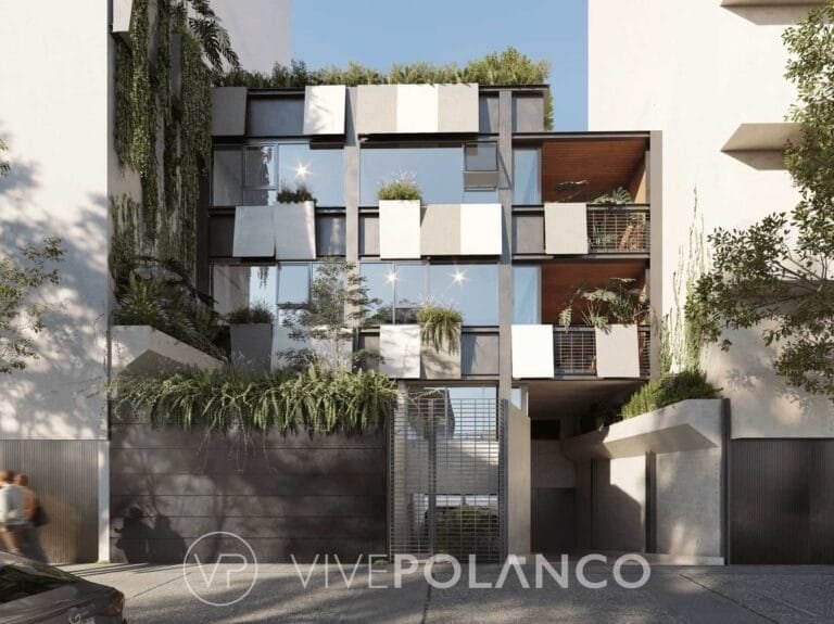 Fachada de edificio residencial contemporáneo con diseño modular de cubos blancos y grises, vegetación en Schiller, Polanco