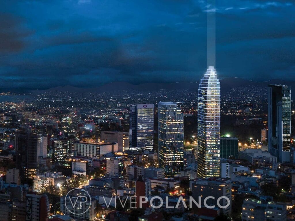Vista aérea nocturna del skyline de Ciudad de México con la torre de Thompson Mexico City Residences iluminada sobre Paseo de la Reforma